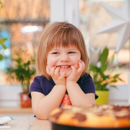 cta-02 A young girl with a happy smile.