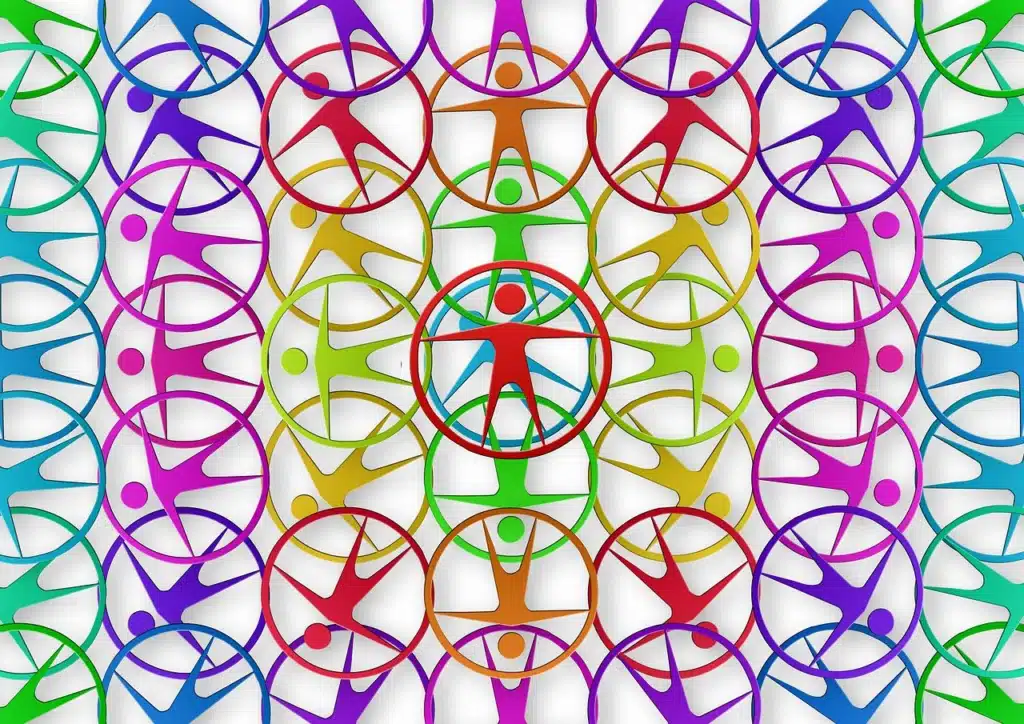 Colorful abstract design featuring human figures inside circles, overlapping in a concentric design, symbolizing unity and diversity in vibrant hues.