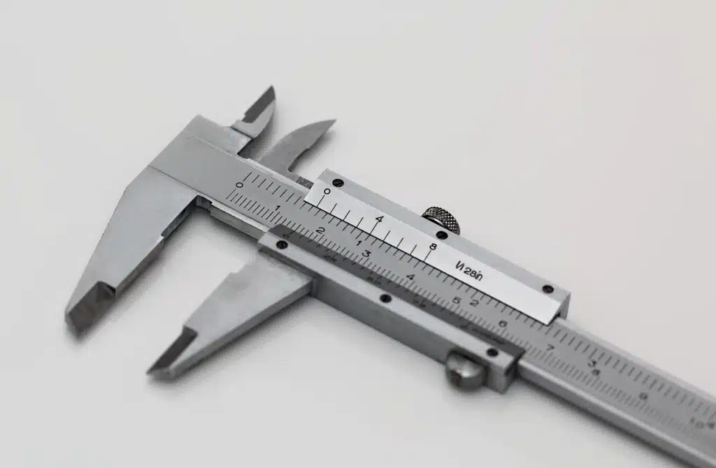 Close-up stock photo of a steel caliper, symbolizing precision and accurate measurement.