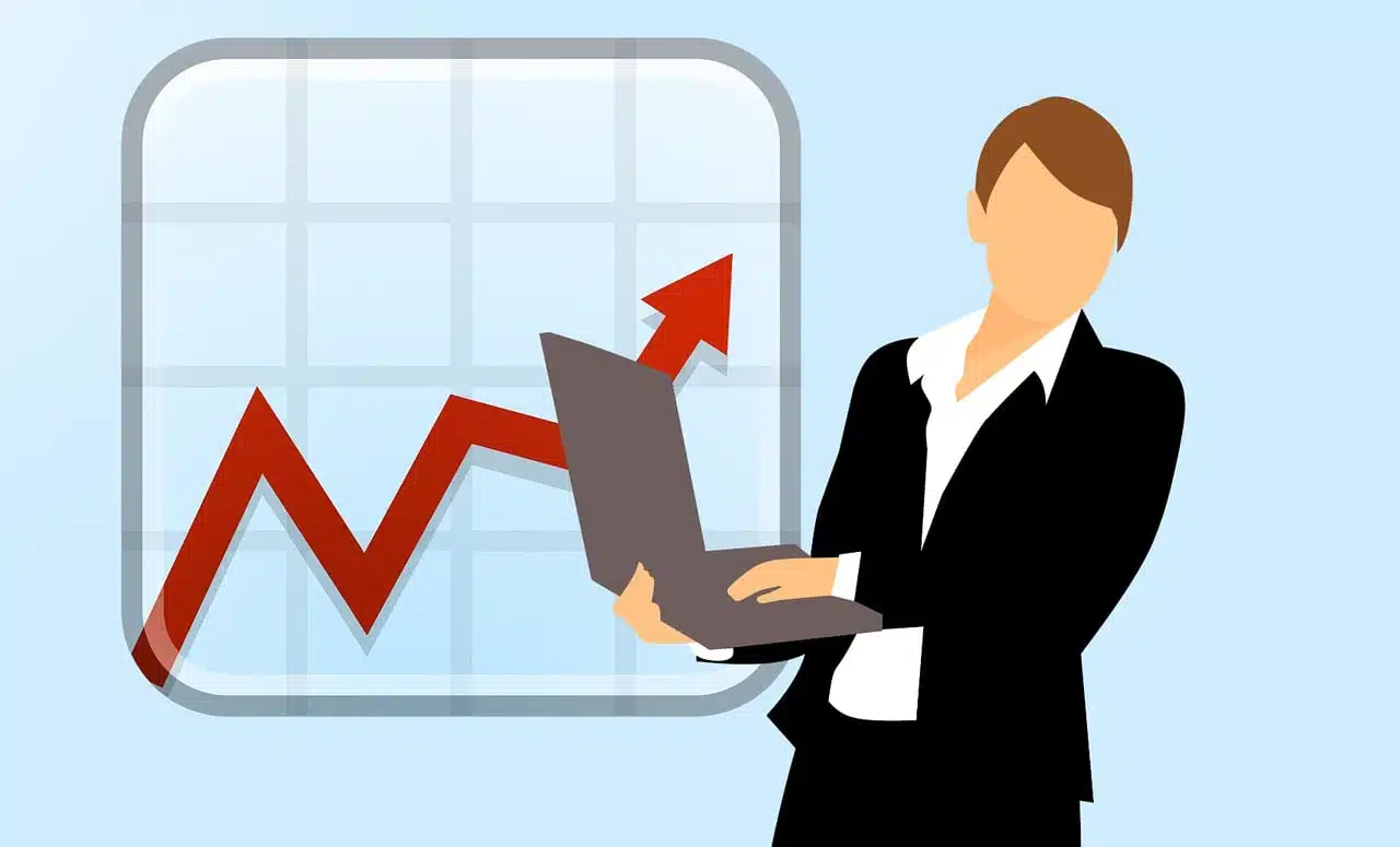 A digital illustration of a professional woman in a business suit holding a laptop. Behind her, a large white graph with a red line shows a clear upward trend, symbolizing progress and success.