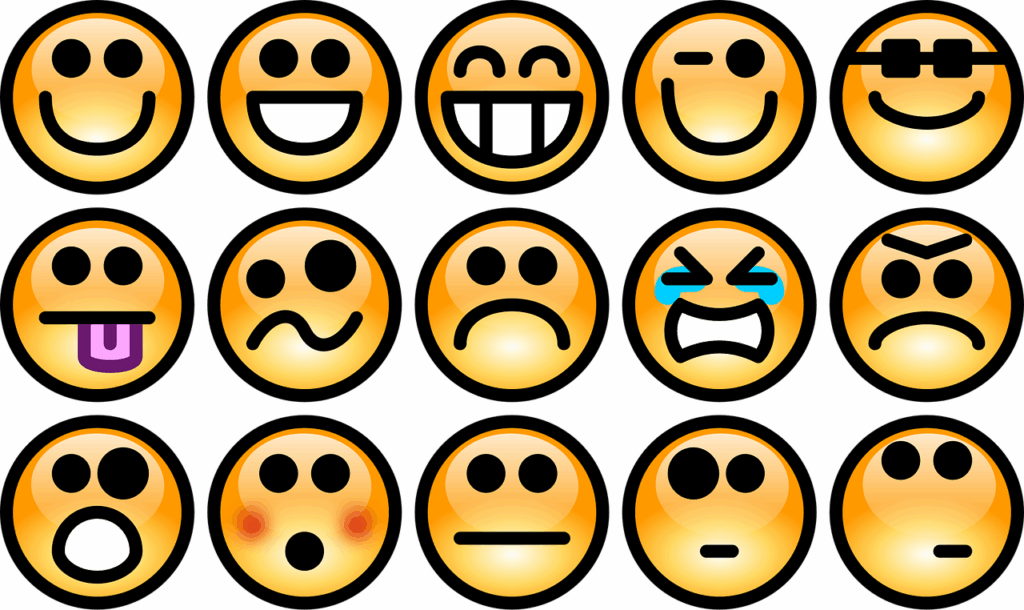 A grid of emoji faces showing a wide range of emotions, from happy to sad, angry, and confused.